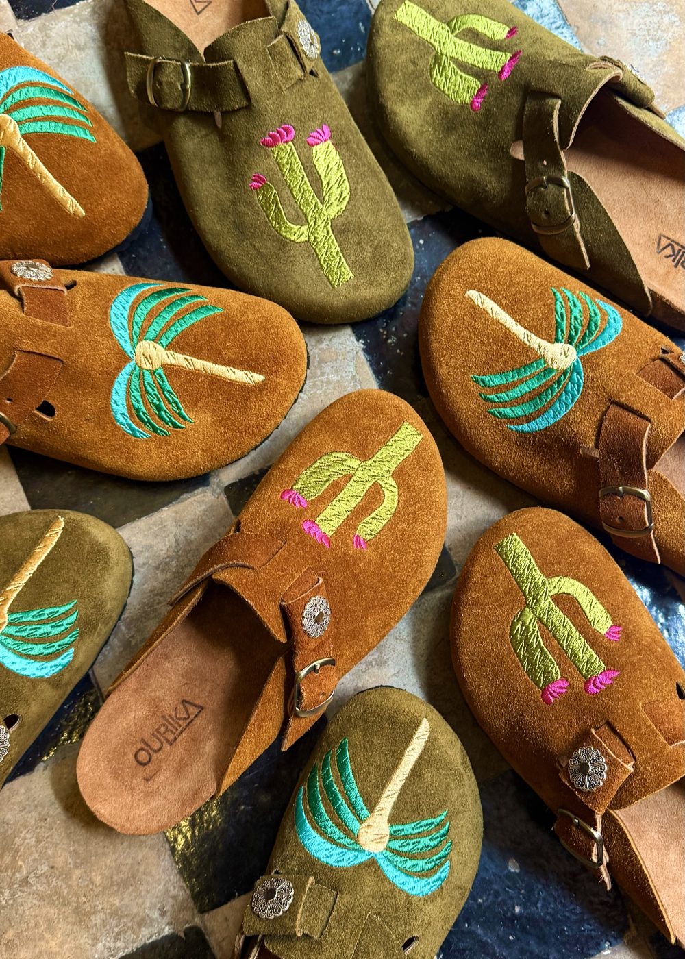 Embroidered clogs