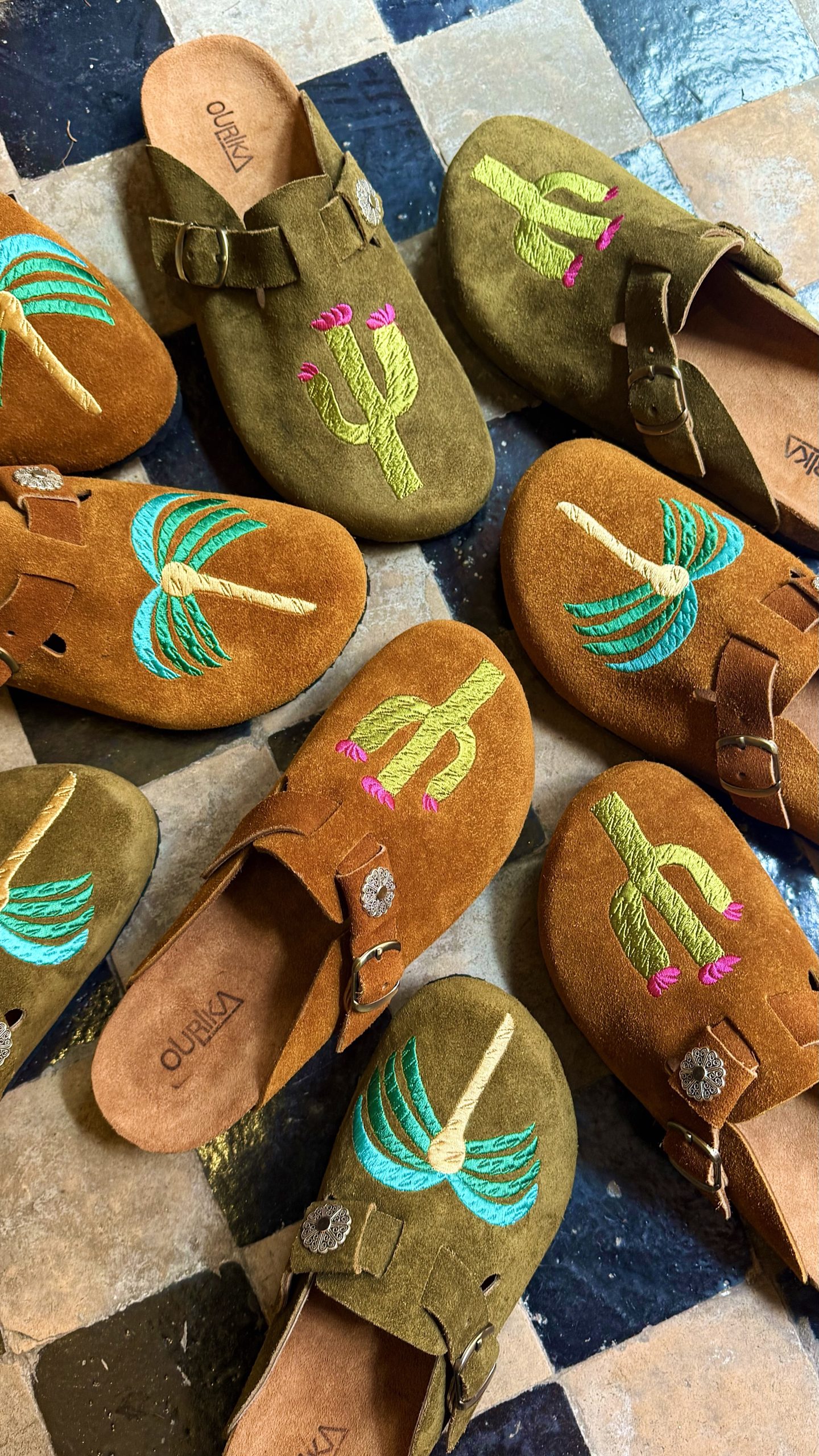 Embroidered clogs